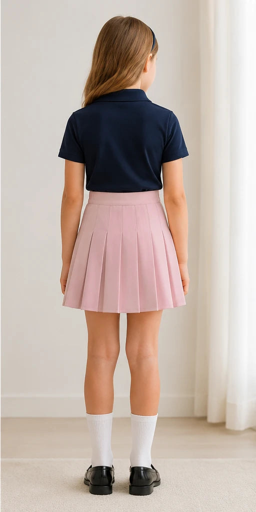 LIUMI Kids Premium Pleated School Skirt in Pink — back view, worn with a navy school polo