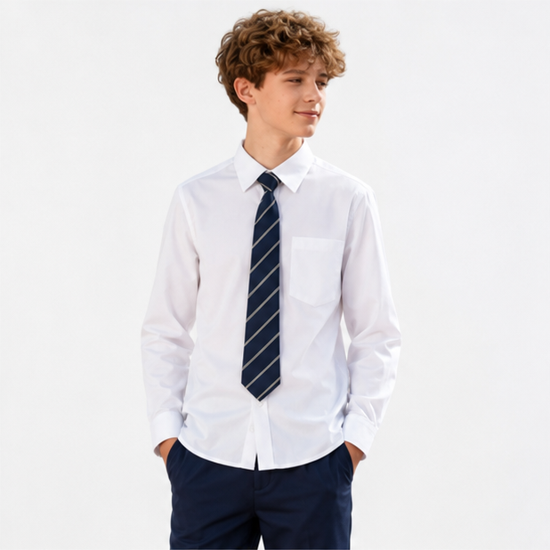 Boy wearing the LIUMI Kids Premium White Long Sleeve School Shirt, three-quarter view, styled with a navy school tie (tie not included)