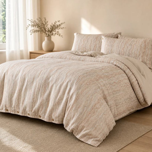 Alabaster marbled cotton duvet set with matching pillow shams, angled bedroom view