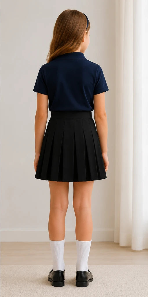 LIUMI Kids Premium Pleated School Skirt in Black — back view, worn with a navy school polo